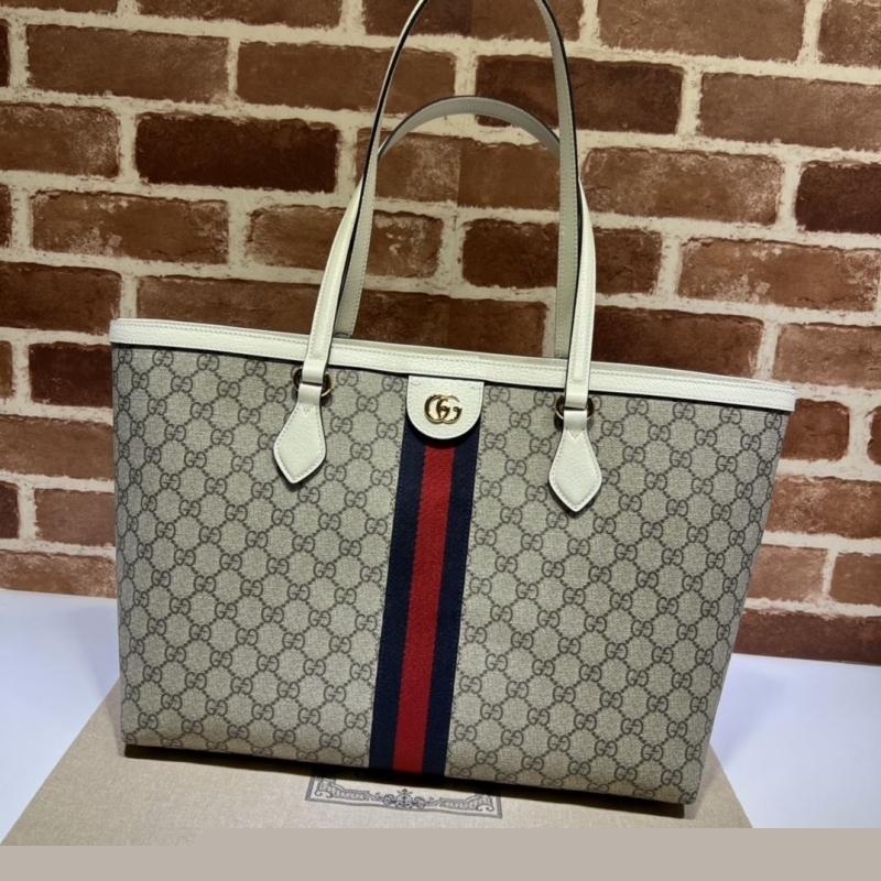G*u*i shopping bags